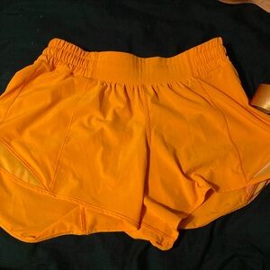 LUlu orange hotty hots size 6 high rise liner has Been cut